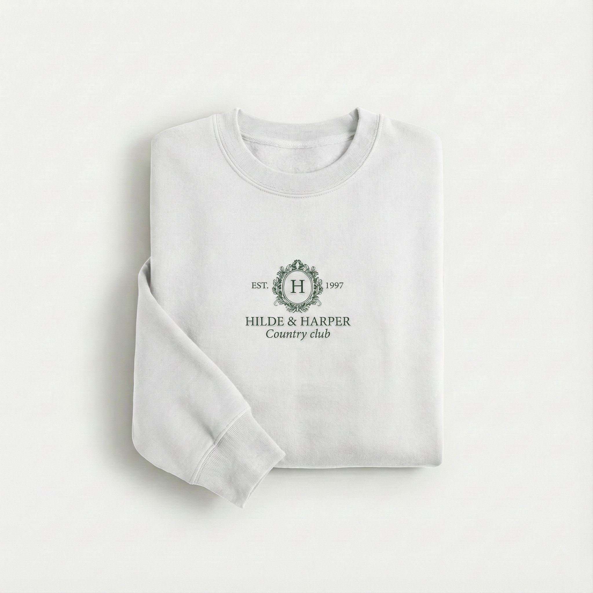 The heritage White Crewneck with Subtle Forest Green Logo