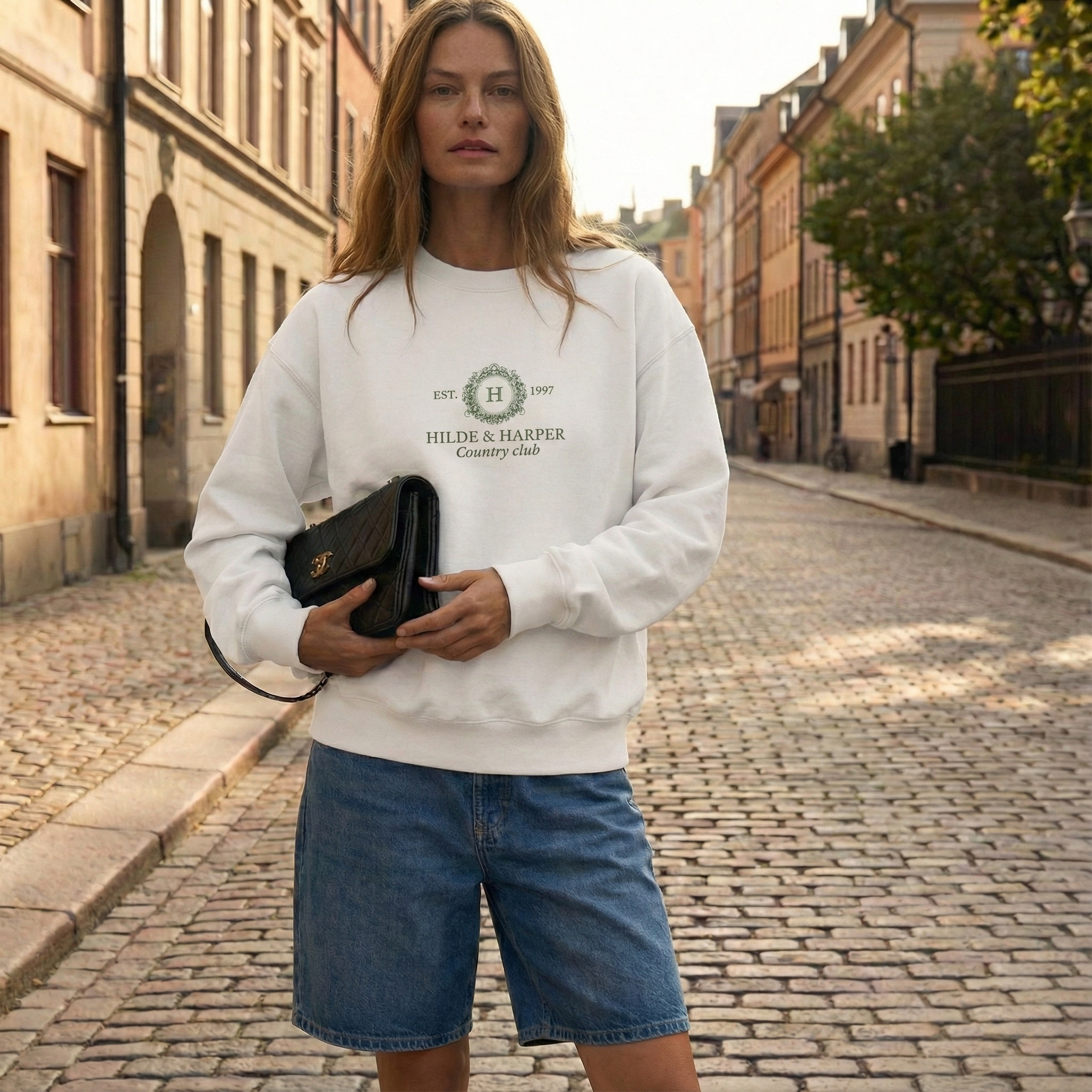 The heritage White Crewneck with Subtle Forest Green Logo